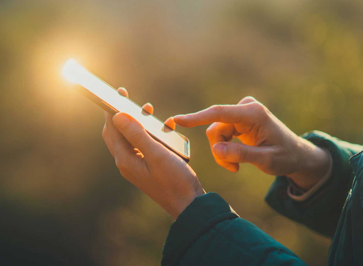 A person scrolls through their phone