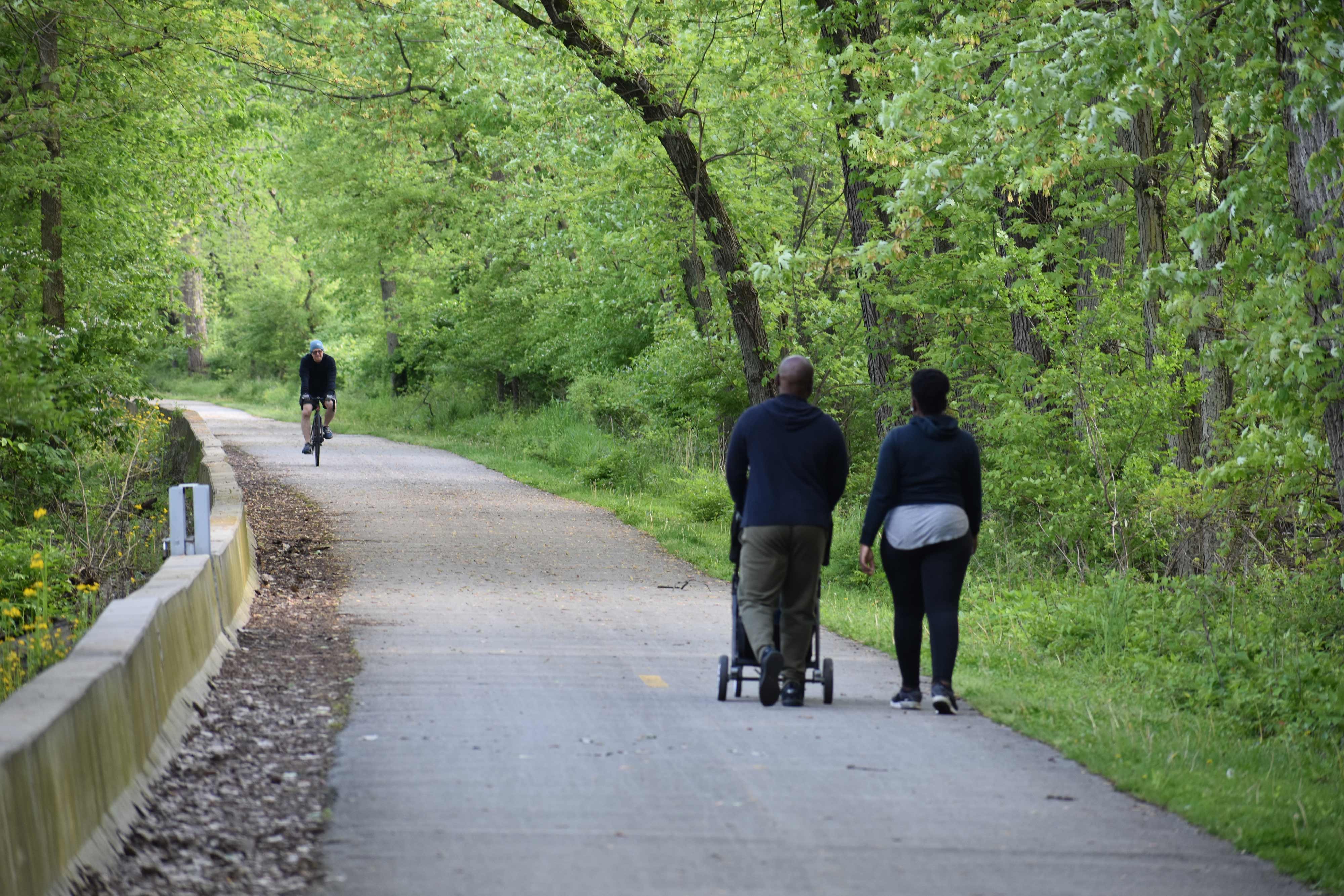 Trail users with a stroller.