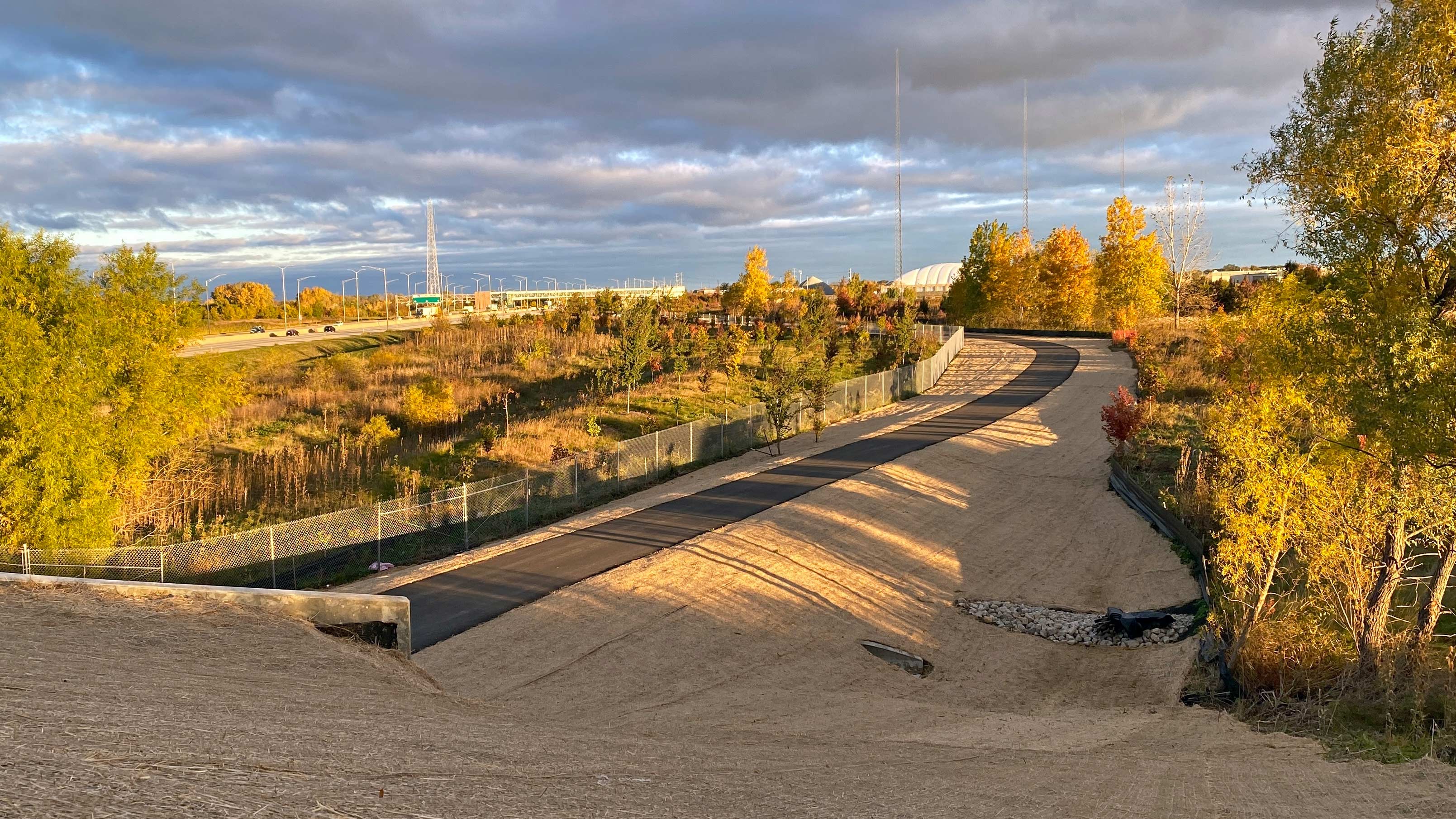 A view of a newly constructed paved trail. 