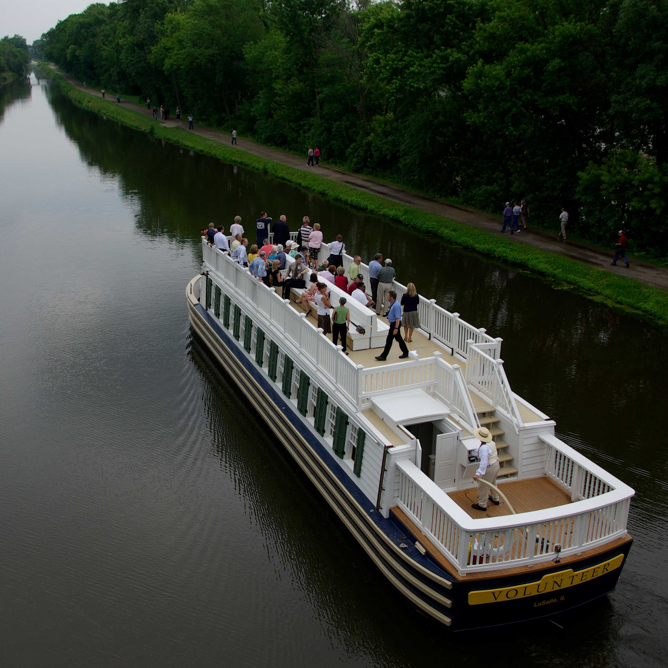 A boat travels down the I&M Canal