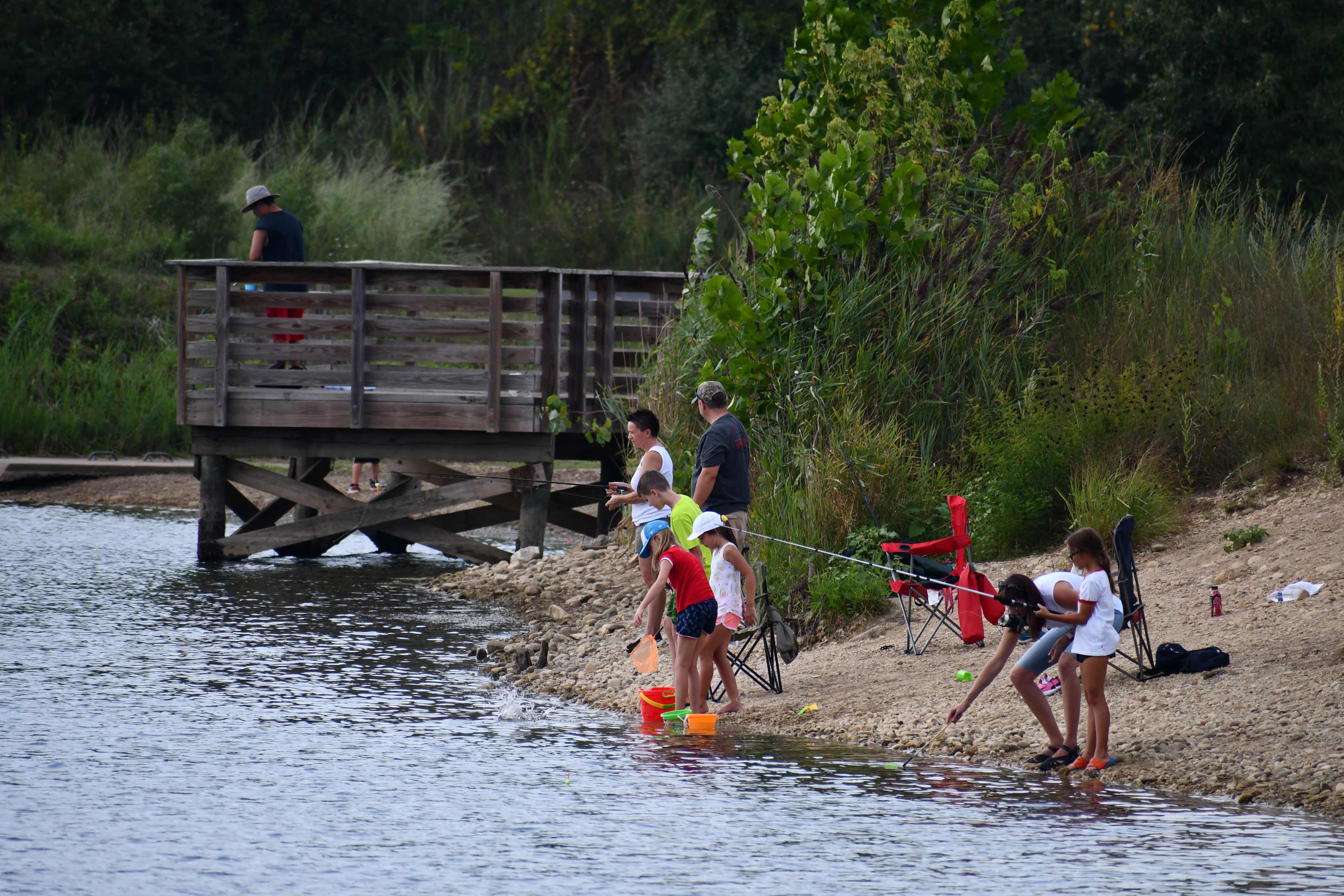 Preserve visitors fishing at Lake Chaminwood.