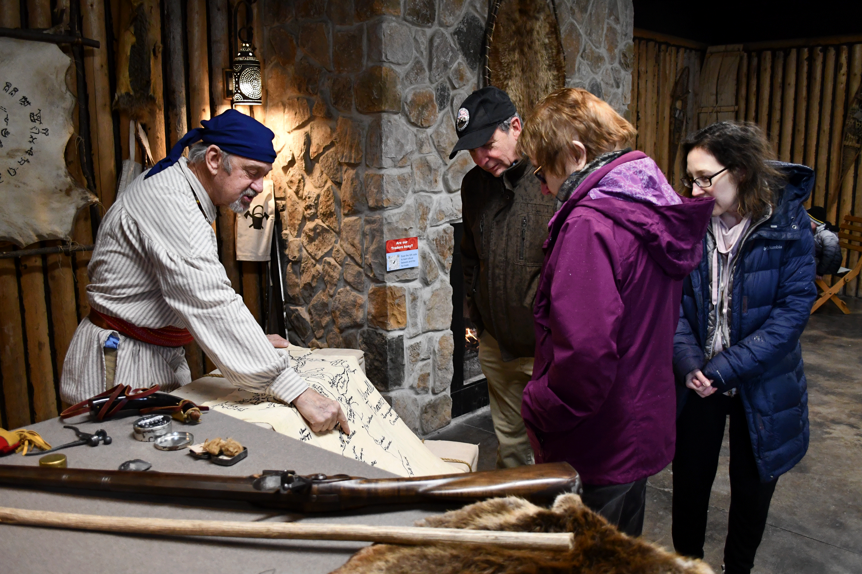Museum visitors exploring an exhibit.