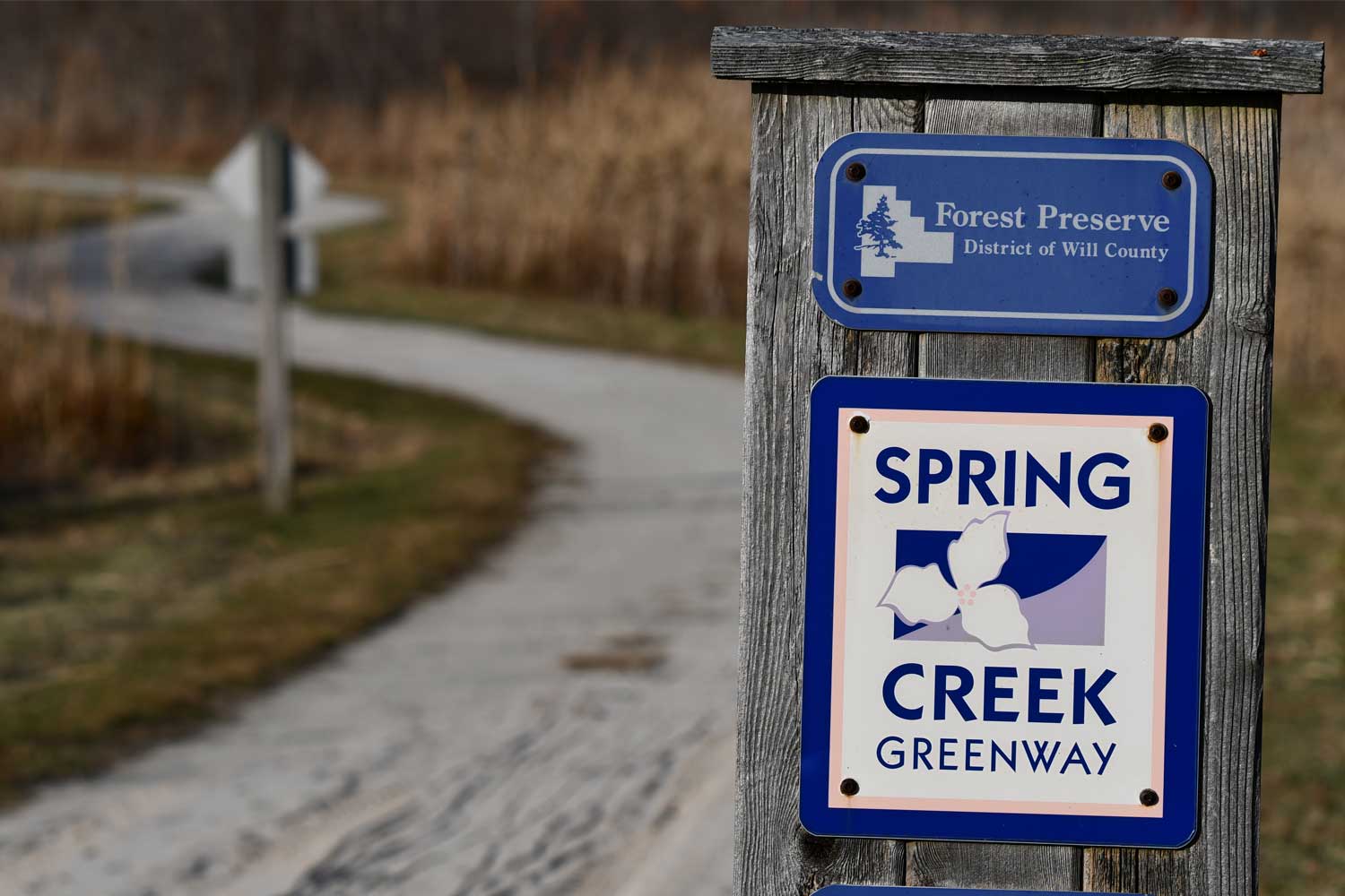 Trail sign along a limestone trail. 