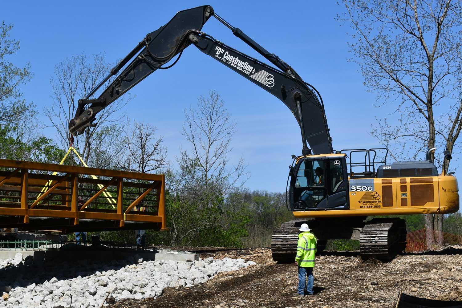 Construction vehicle moving bridge.