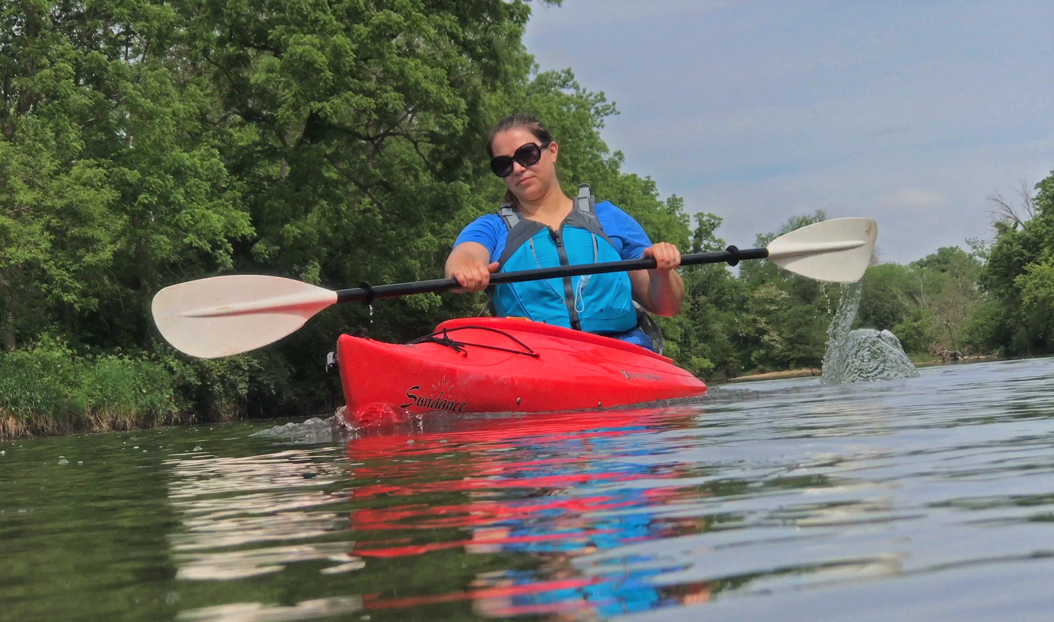 A kayaker out on the water.