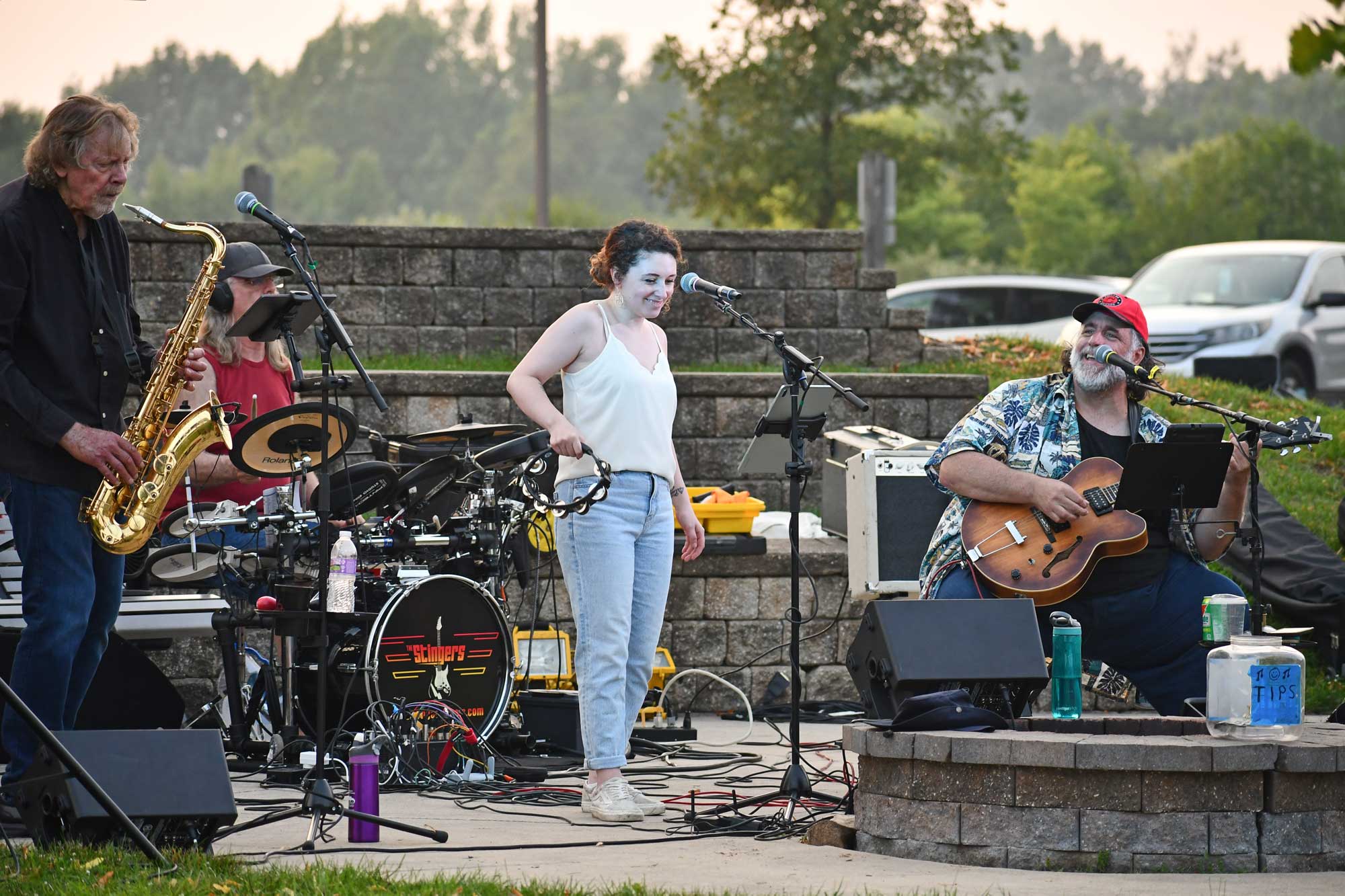 A band performs outside. 
