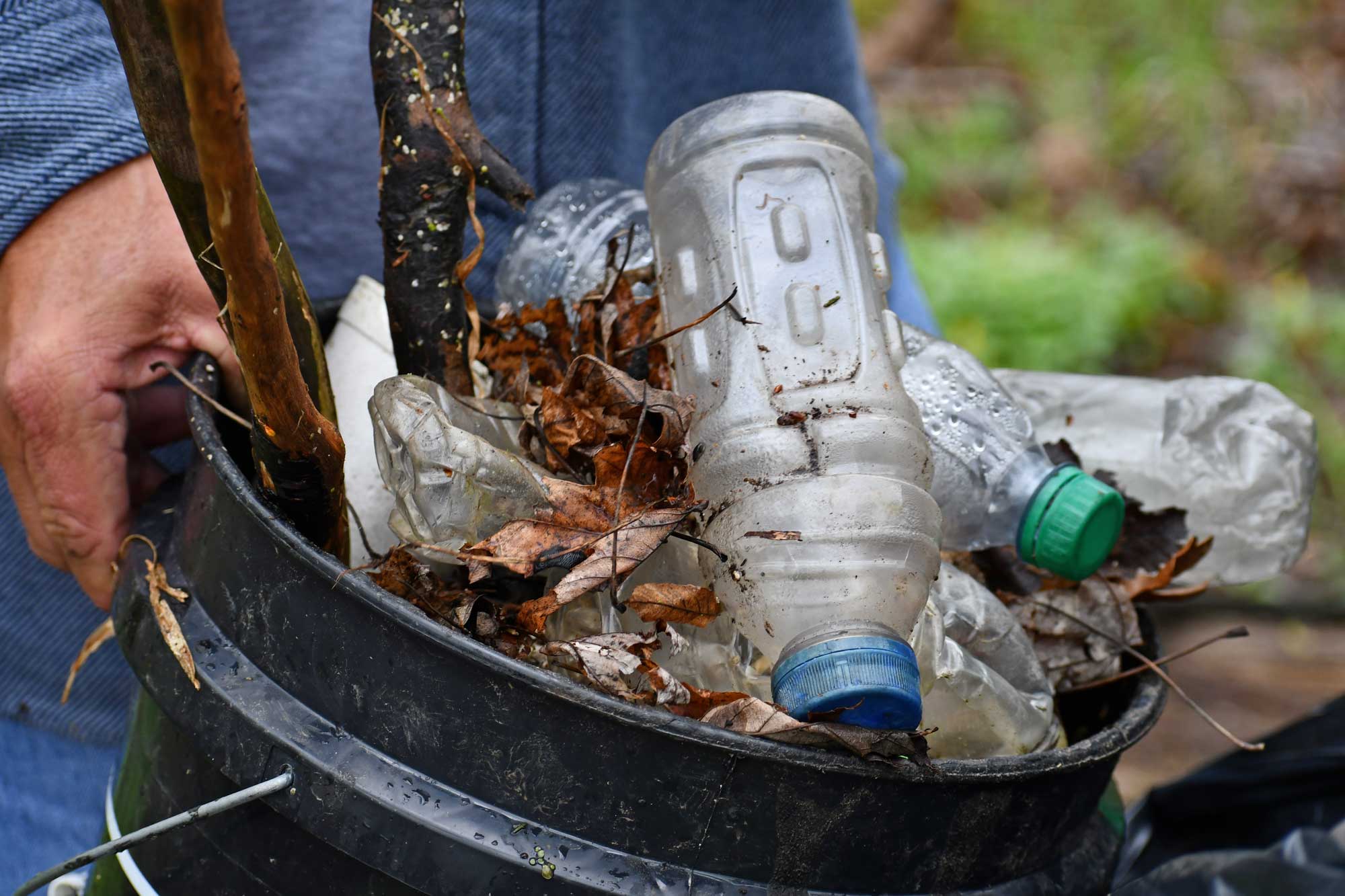 A bucket filled with trash.
