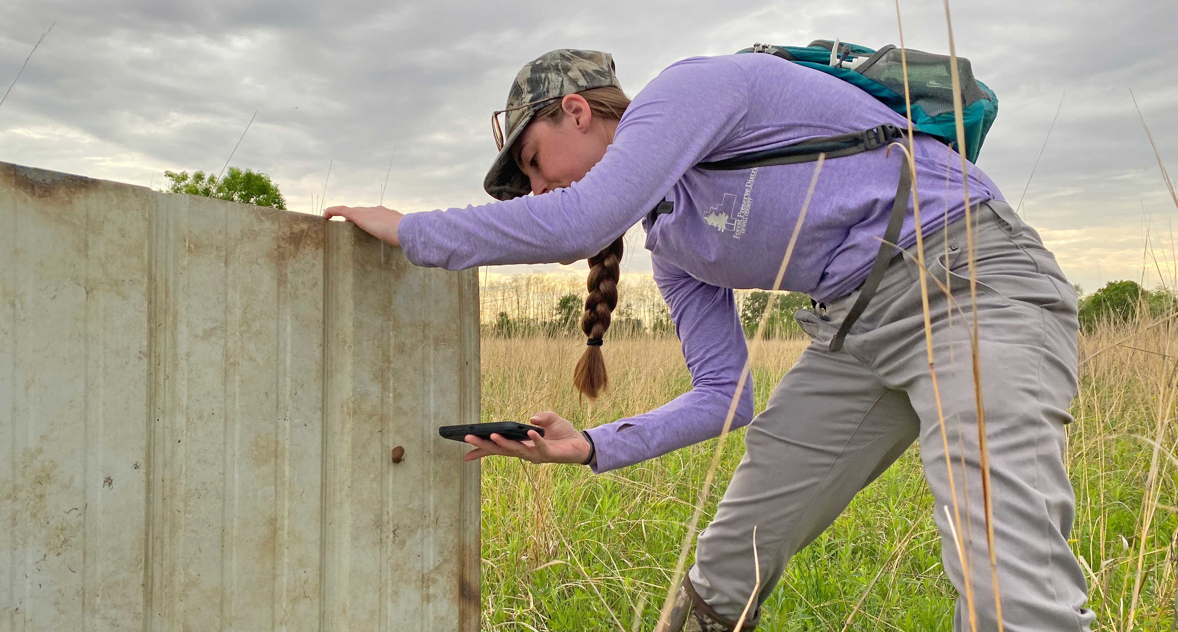 Becky Blankenship near a coverboard in a preserve