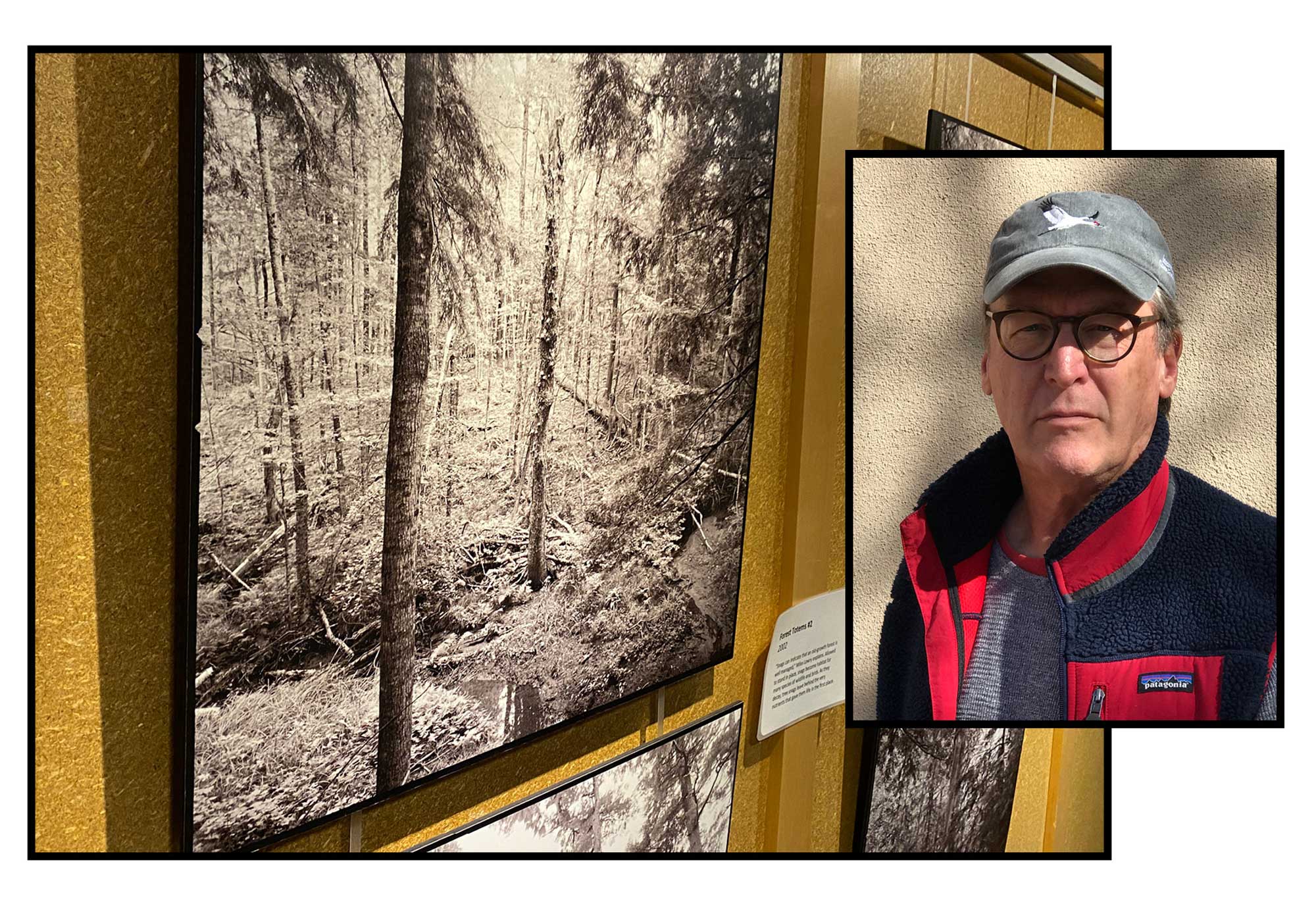 Portait of a man with some of his photographs. 