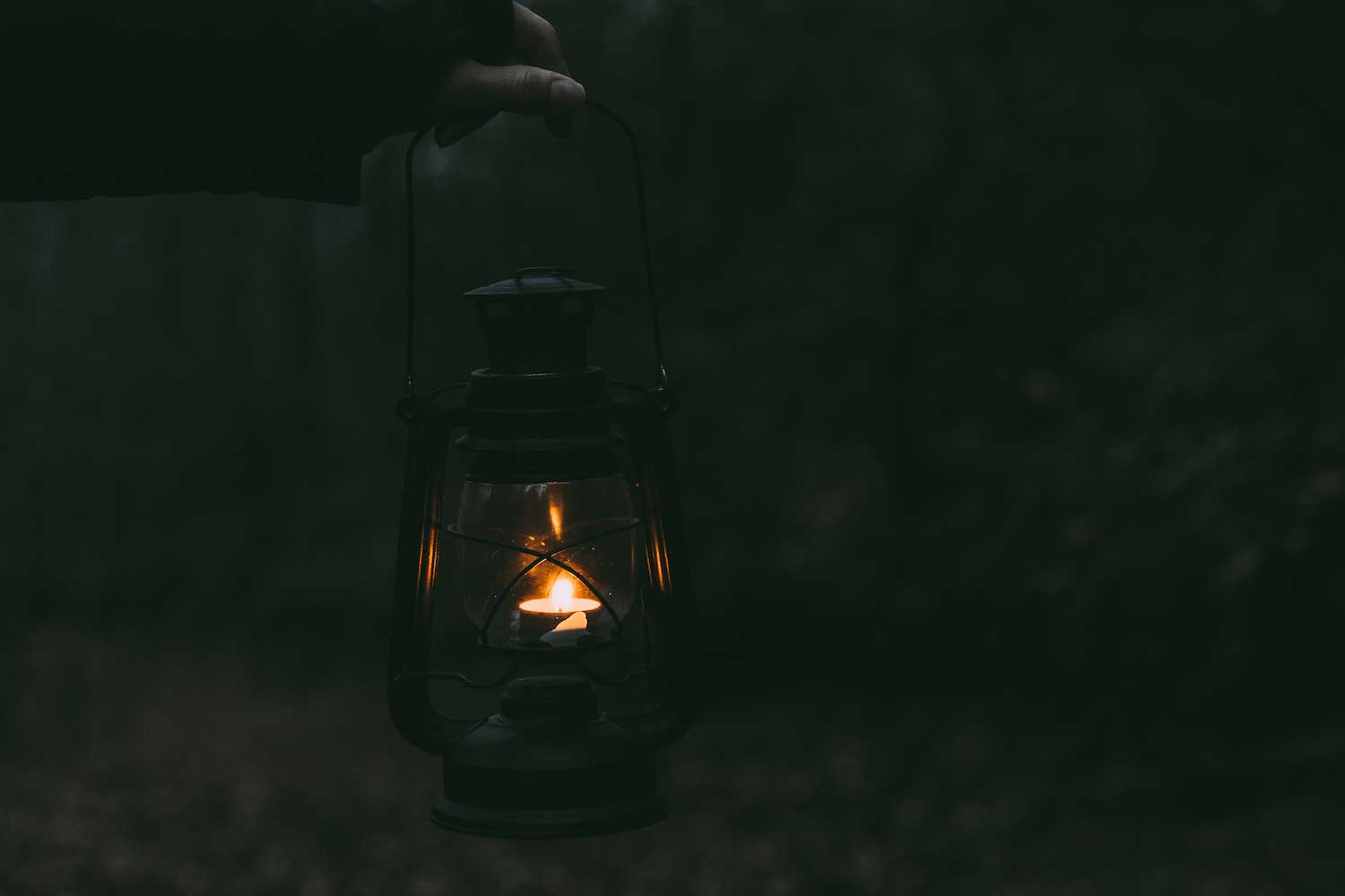 The glow of a lantern in the dark. 