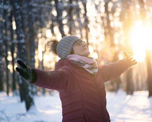 A woman outside in winter