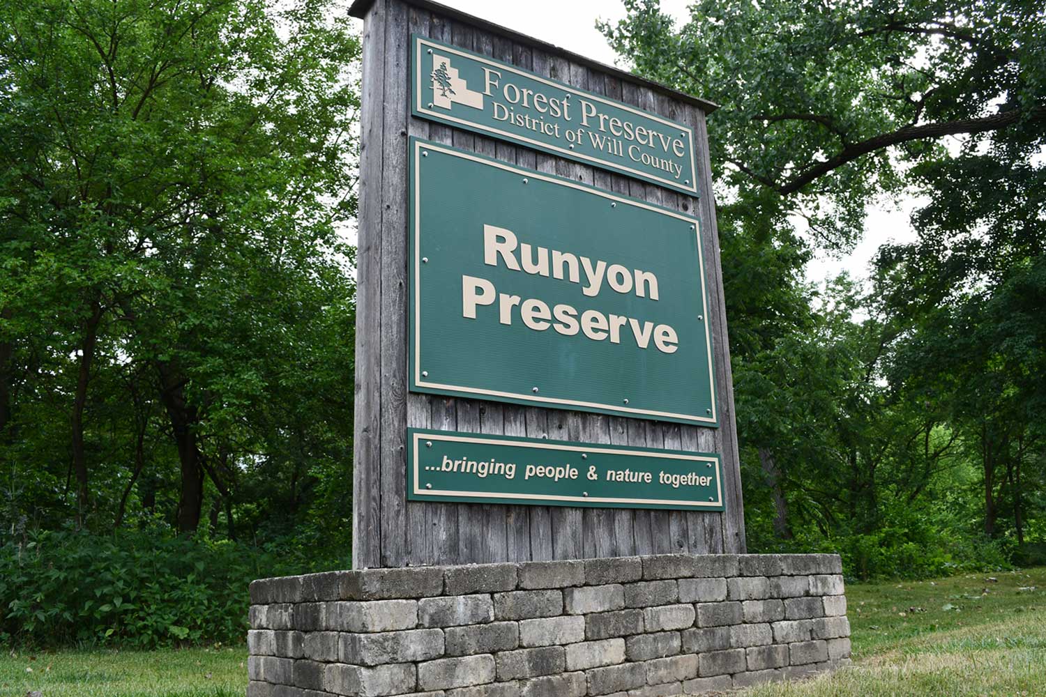 Preserve sign in front of trees.
